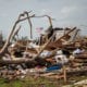the remains of a house after a tornado