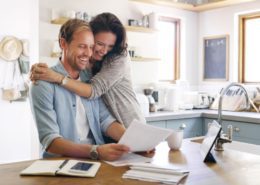 couples at home wondering why homeowners insurance premiums are still high