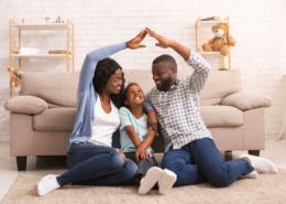 family discussing how to reduce your home insurance premiums
