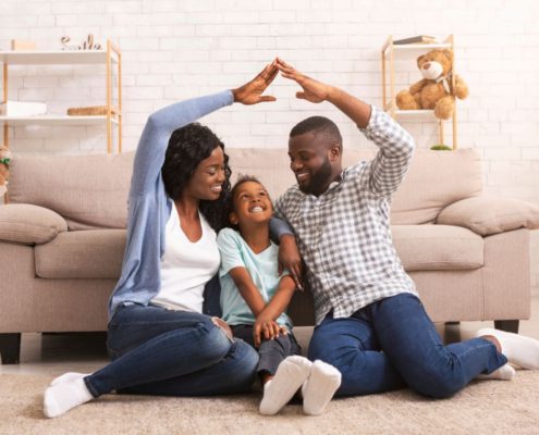 family discussing how to reduce your home insurance premiums