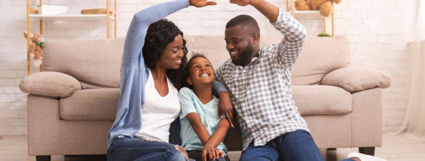 family discussing how to reduce your home insurance premiums