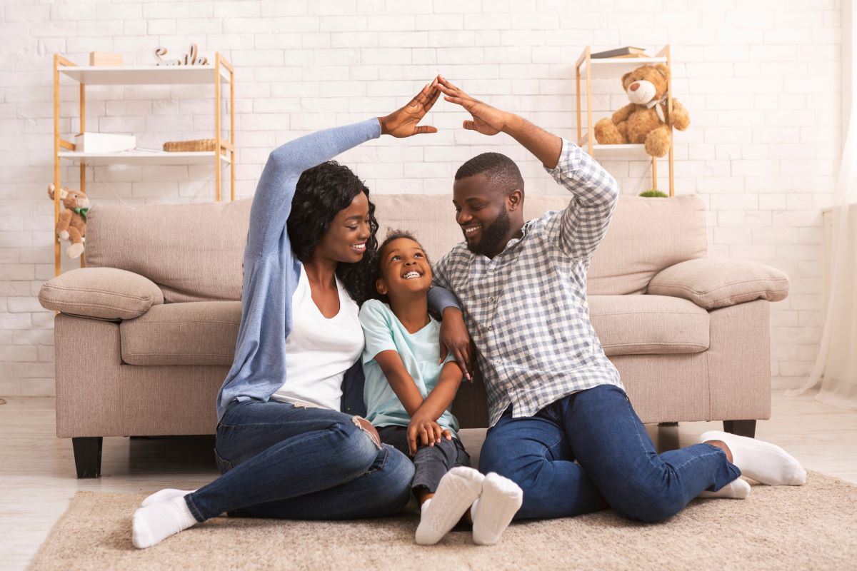 family discussing how to reduce your home insurance premiums